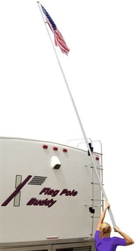 Do you have to have a ladder to mount the flag pole on a trailer?