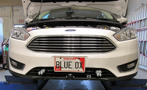 Will this Blue Ox BX2663 base plate work with the Reese Tow bar, and is it designed for the non-adaptive cruise control Titanium?