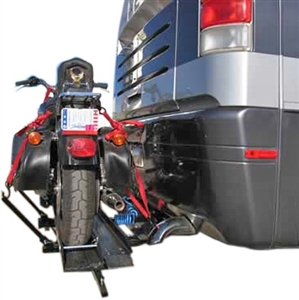 I have a Ford F-350 and  9-6 lance camper, can I add a towing extension and still use your motorcycle cairrier?